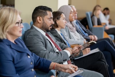 people sitting at conference
